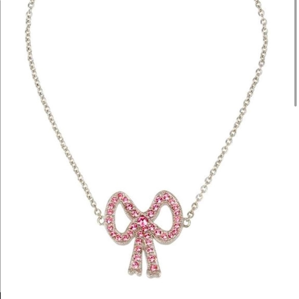 Coach pink bow necklace.